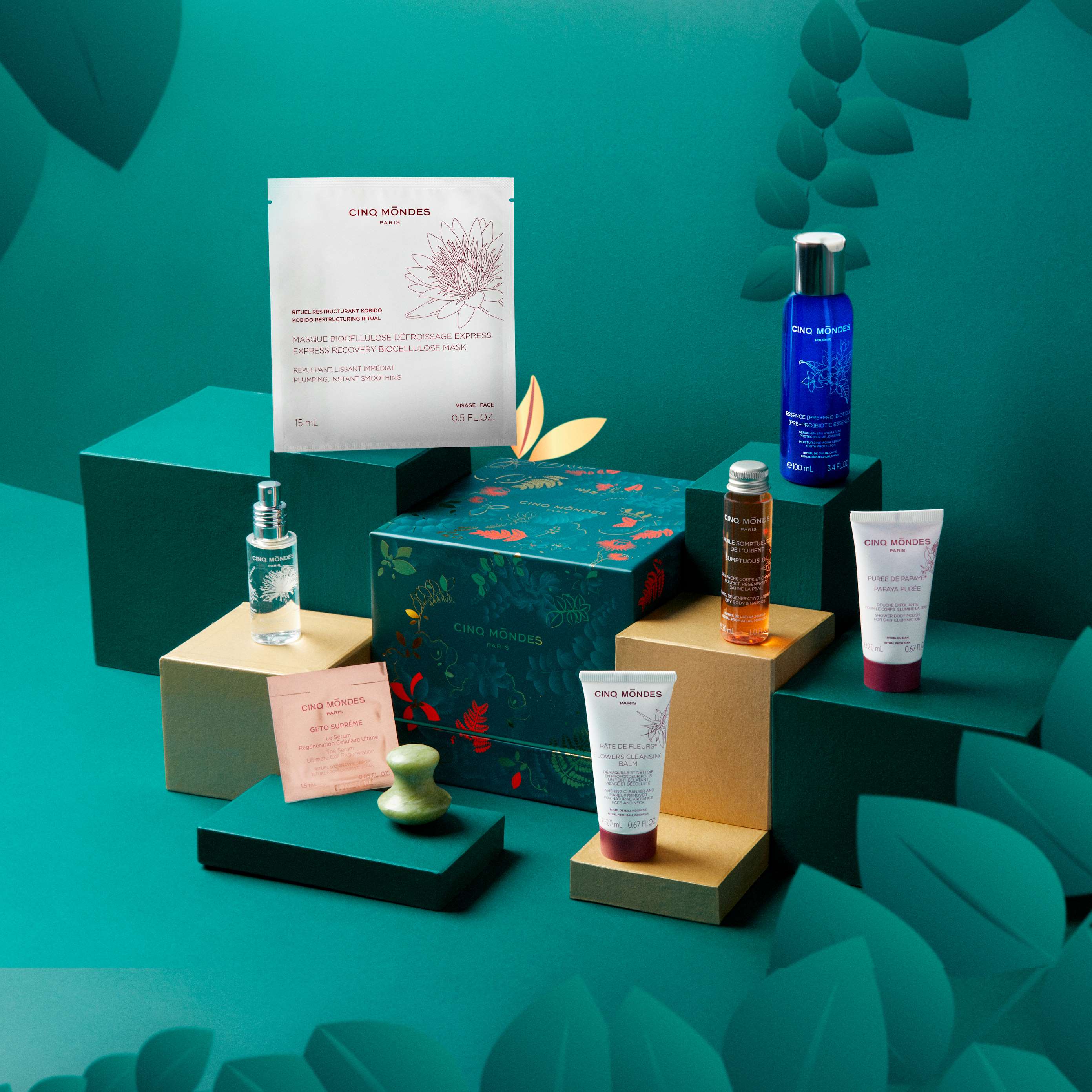 détail et contenu du coffret jardin enchanté cinq mondes magnifique coffret contenant essence probiotique cinq mondes masque cellulose et d'autres surprises